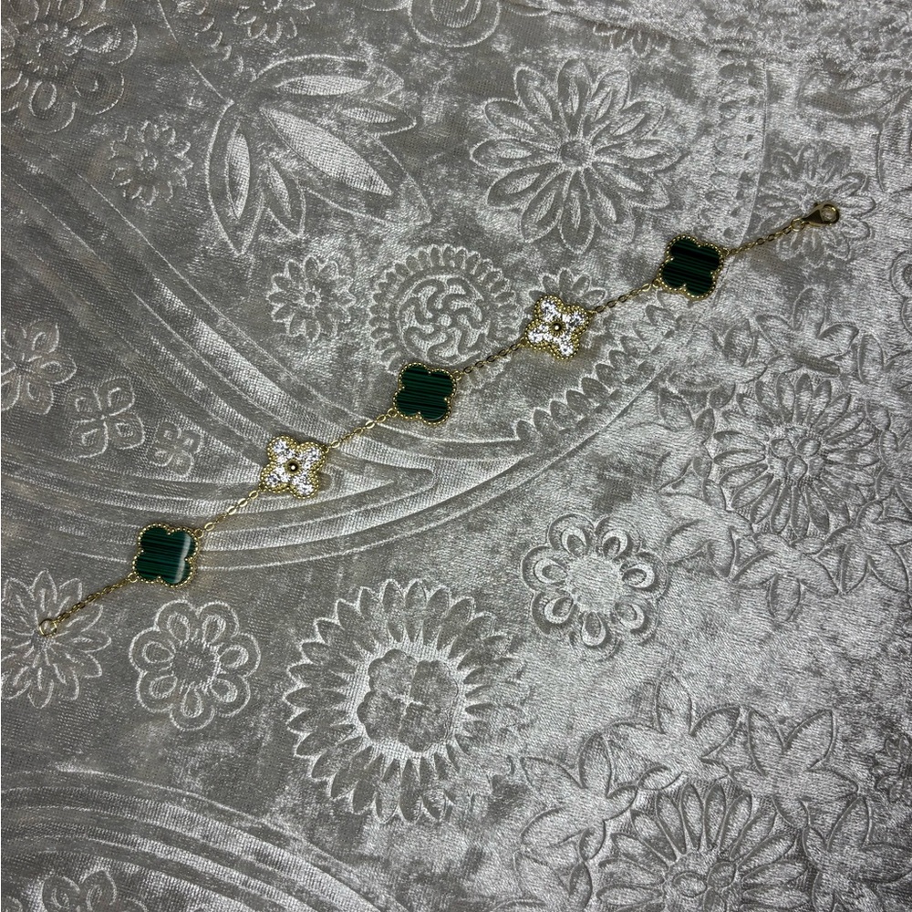 Gold Bracelet with Green Clover Accents and Crystal Flowers